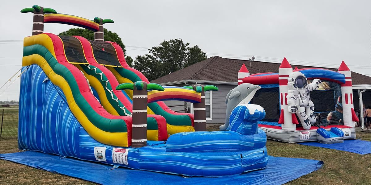 Kids bouncing and laughing in colorful inflatable bounce house rental