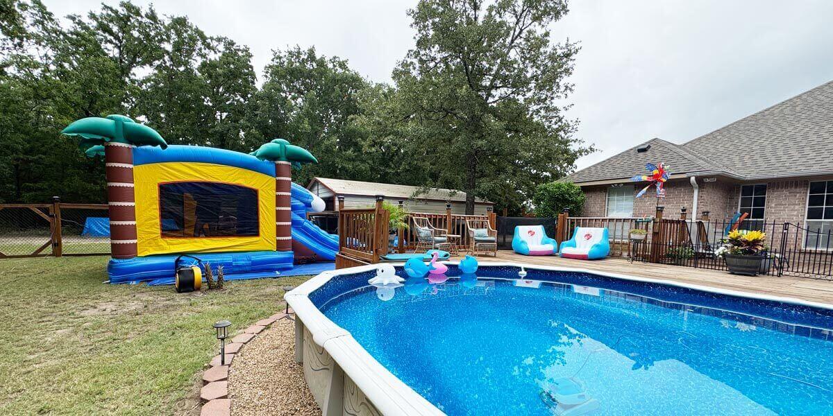 Twin Unicorns Party bounce house combo unit with slide for birthday celebration