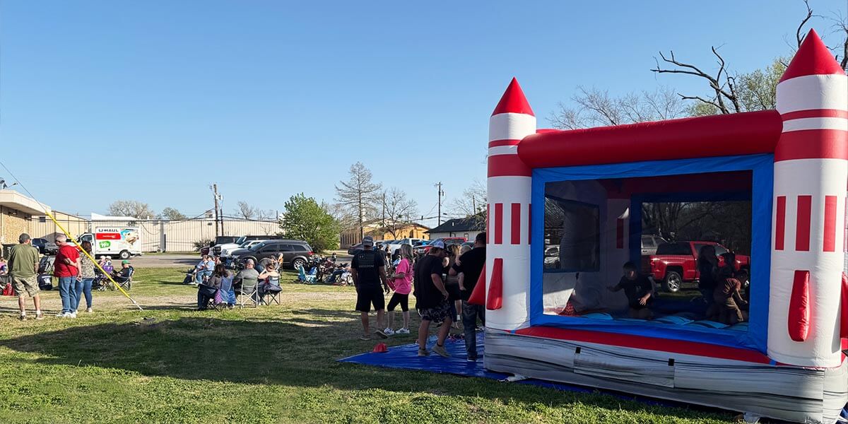 Inflatable obstacle course rental setup for school fundraiser event